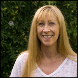 Denise Law smiling face with trees in background